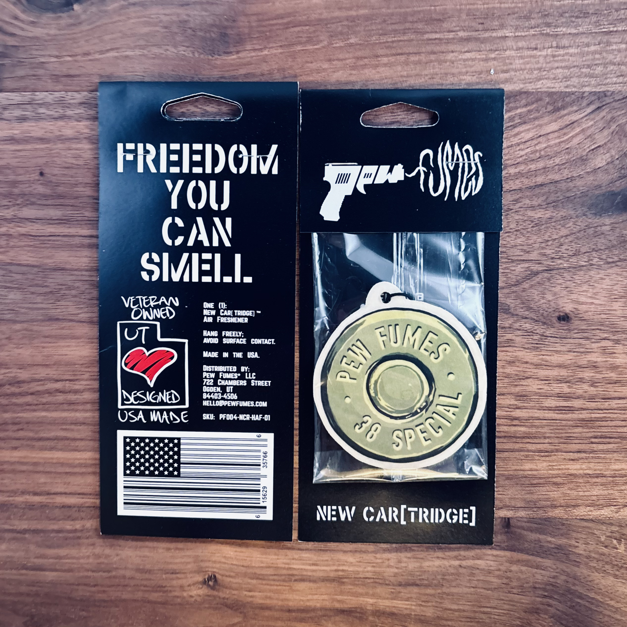 New Cartridge hanging air freshener showing front and back of packaging